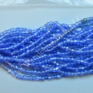 Antique Seed Bead 11/0 Translucent Baby Blue Cuts