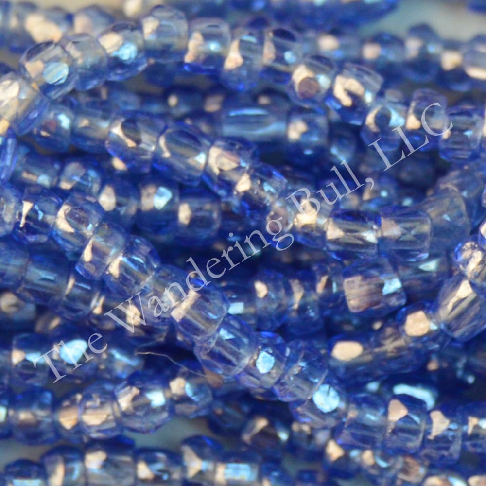 Antique Seed Bead 11/0 Translucent Blue Lavender Cuts